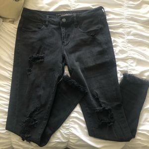 Black distressed super low rise jegging
